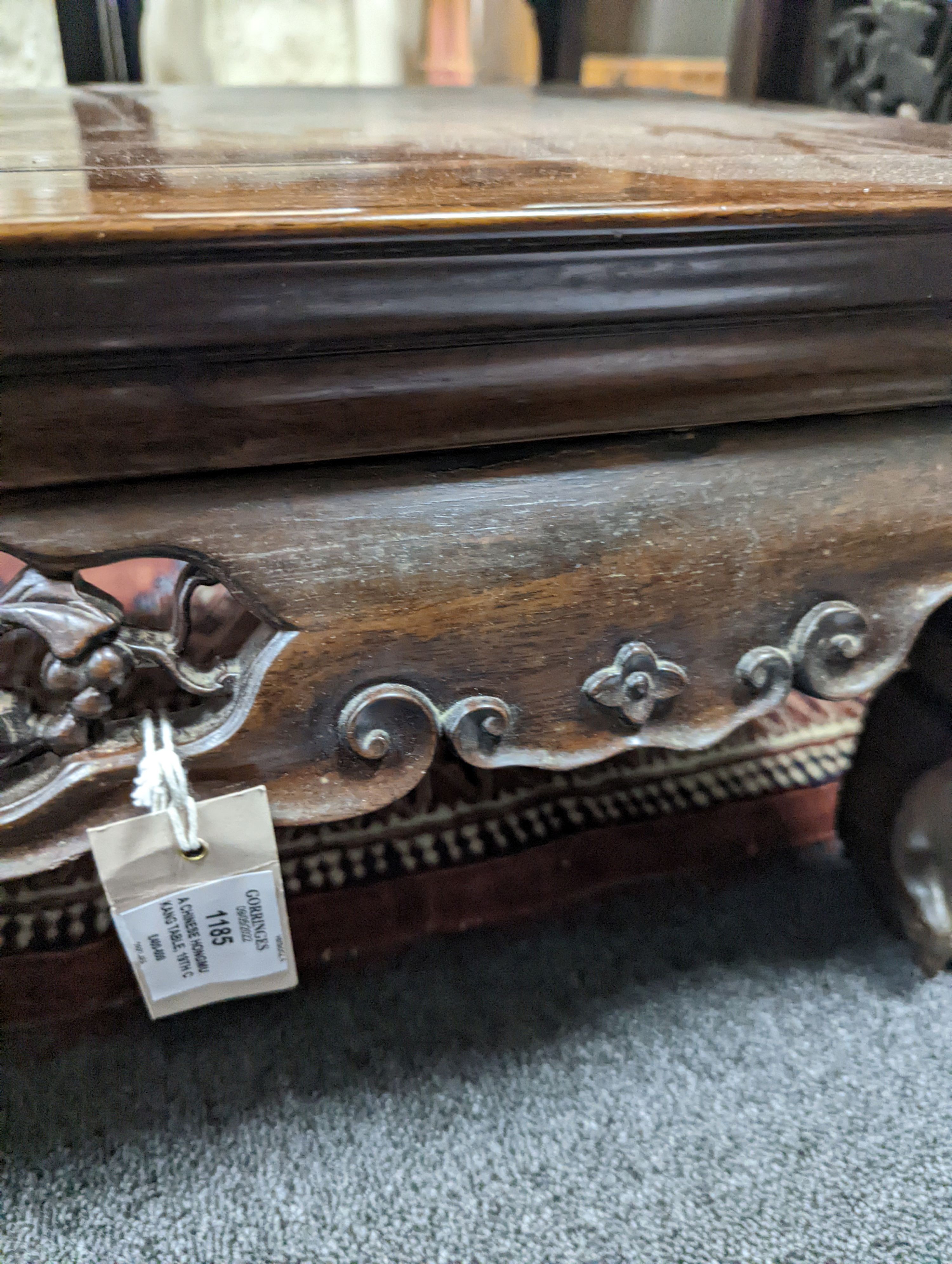 A Chinese hongmu Kang table, 19th century, 79 cm long, 43 cm wide, 27 cm high, old repairs